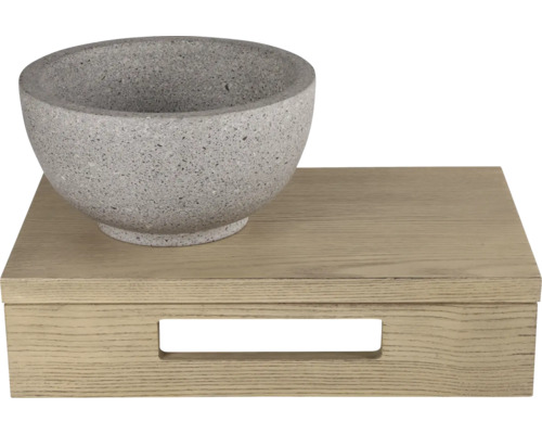 Dekoschale aus Stein auf einer Holzbox