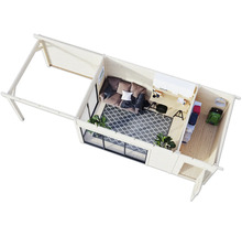 Draufsicht eines Holzgartenhauses mit Sitzecke und Arbeitsplatz