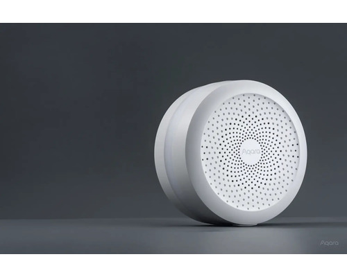 Aqara Logo auf einem runden, drahtlosen Smart Home Gerät