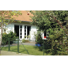 Haus mit Gartenzaun und Gartentor