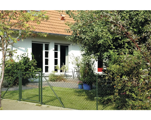 Haus mit Gartenzaun und Gartentor