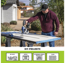 Mann verwendet Farbsprühgerät für DIY Projekt