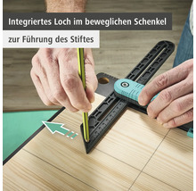 Eine Person benutzt eine Anreißlehre, um eine Linie auf einem Holzbrett zu zeichnen.