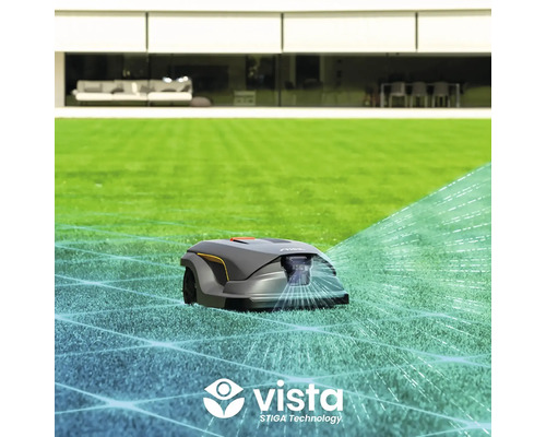 Mähroboter auf Rasenfläche vor einem Haus