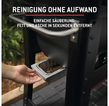 Detailaufnahme eines Grills, der die einfache Reinigung durch Entfernen von Fett und Asche zeigt