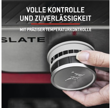 Nahaufnahme eines Drehknopfes zur Temperaturkontrolle eines Grills.