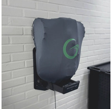 Wandladestation mit Abdeckung und Logo an einer Ziegelwand