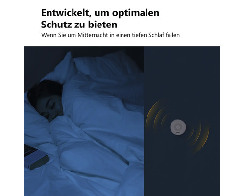 Szene mit schlafender Person im Bett und einem Gerät, das Schutz bietet
