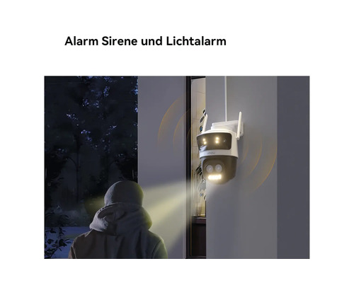 Überwachungskamera mit Alarm-Sirene und Lichtalarm erkennt eine Person bei Nacht.