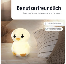 Warm leuchtendes Pinguin-Nachtlicht für Kinder auf einem Bett, wiederaufladbar, keine Erwärmung, einfache Bedienung per Ein- und Ausschalter.
