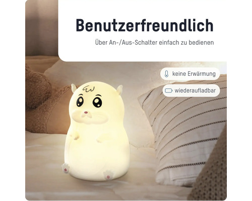 Benutzerfreundliches Nachtlicht in Hamsterform auf einem Bett, einfach bedienbar, aufladbar und ohne Wärmeentwicklung.