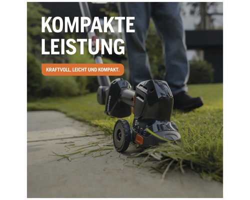 Kompakter Akku-Rasentrimmer beim Trimmen einer Rasenkante an einem Gartenweg aus Stein.