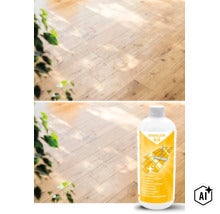Eine Flasche Rakkuun Parkettreiniger vor einem verlegten Holzboden, der durch Lichteffekte beleuchtet wird. (Image AI modified or generated)