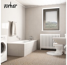 Badezimmer mit Badewanne, Waschmaschine, Toilette, Heizkörper und Fenster