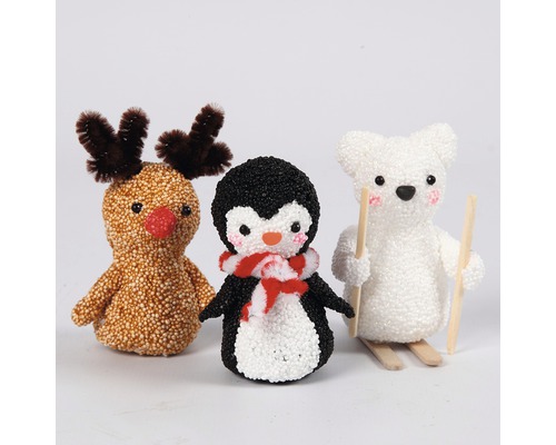 Dekorative Figuren mit Rentier, Pinguin und Eisbär für Weihnachten
