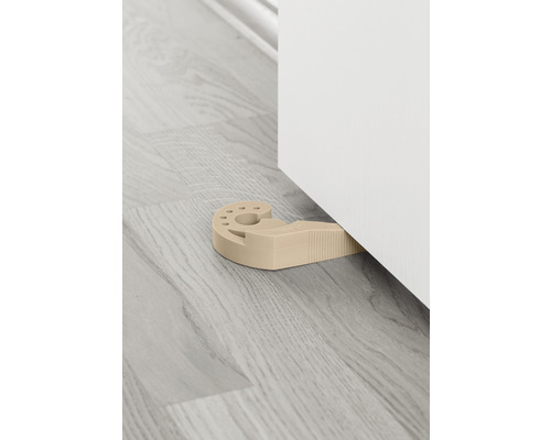 Türstopper aus Kunststoff zwischen Tür und Boden