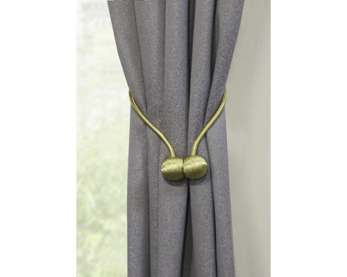 Grauer Vorhang mit goldenem Magnetraffhalter