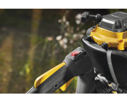 Detailaufnahme eines Trimmers mit Schalter und Griff