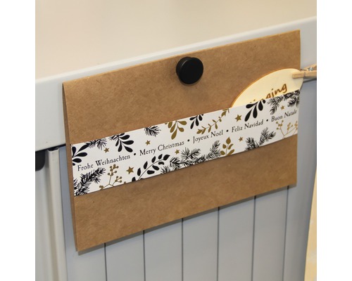 Weihnachtskarte mit Magnet befestigt