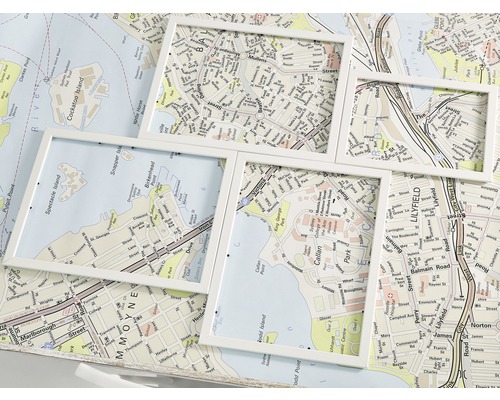 Mehrere weiße Bilderrahmen auf einer Karte von Sydney