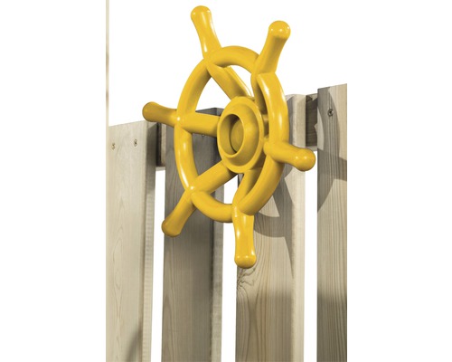 Gelbes Steuerrad aus Kunststoff für Spielgeräte an einem Holzzaun