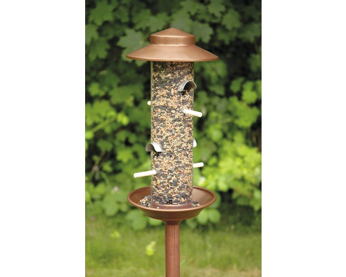 Vogelfutterhaus mit Ständer, gefüllt mit Vogelfutter
