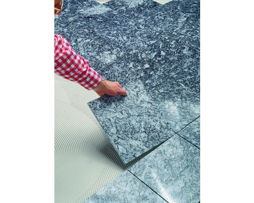 Verlegen von Bodenfliesen mit Muster