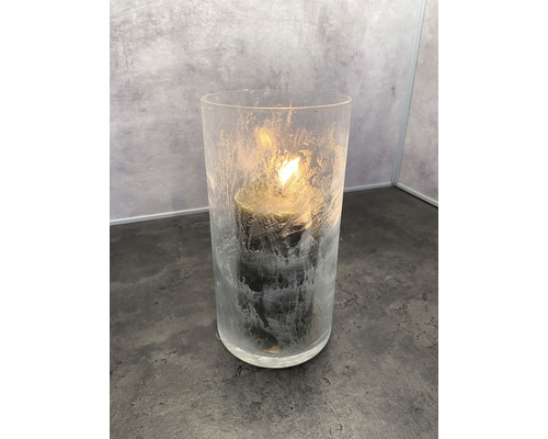 Kerze in Glaswindlicht