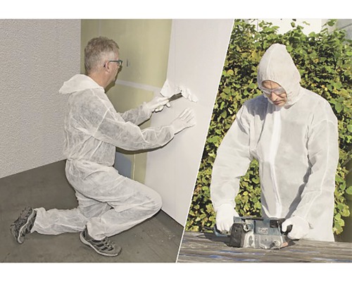 Zwei Handwerker in Schutzanzügen bei Renovierungsarbeiten