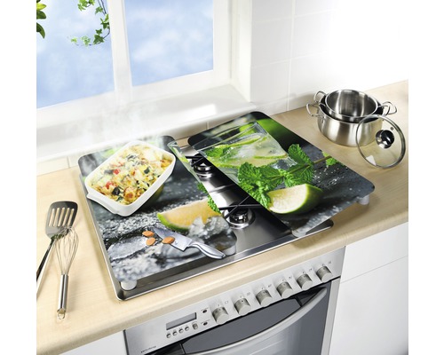 Abdeckplatten für den Herd mit Lebensmittelmotiven auf einem Herd