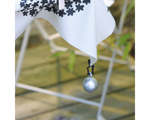 Tischdecke mit Blumendekor und Tischdeckenbeschwerer