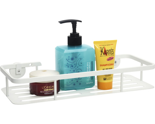 Weisses Duschregal mit Shampoo, Duschgel und Gesichtscreme