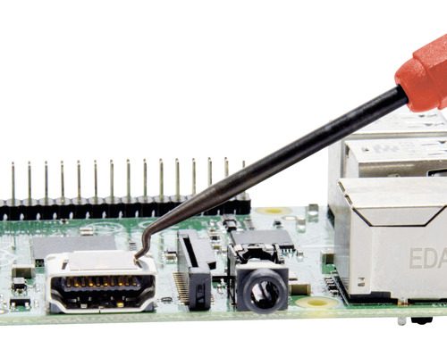 Elektronische Platine mit Lötwerkzeug für Reparaturarbeiten