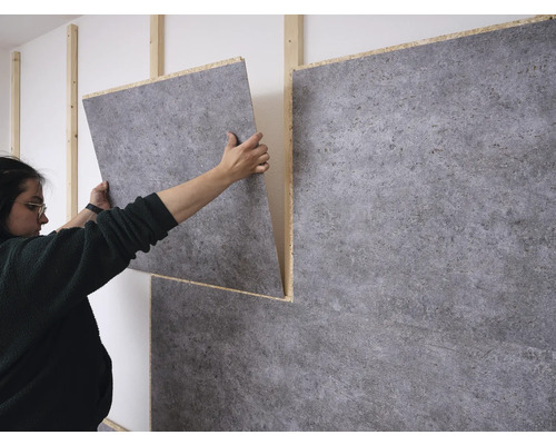 Aufbau einer Wandverkleidung mit Holzunterkonstruktion und Paneelen