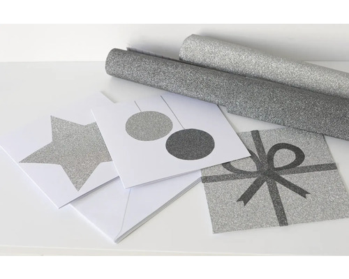 Dekoratives Geschenkpapier und Grußkarten mit Stern-, Kugel- und Geschenkdesign