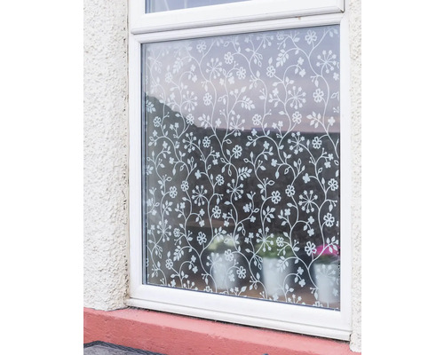 Fenster mit dekorativer Sichtschutzfolie mit Blumenmuster