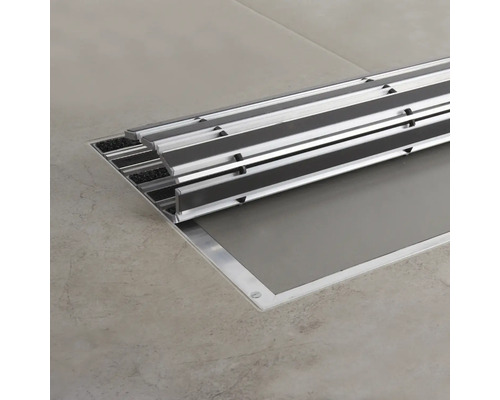 Bodeneinbauschmutzfangmatte aus Aluminium und Textil auf Fliesenboden