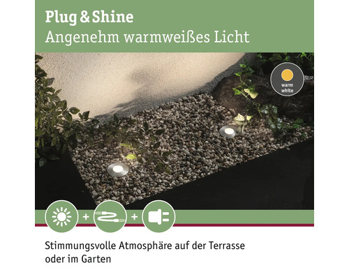 Gartenbeleuchtung mit warmweissem Licht auf Kiesfläche