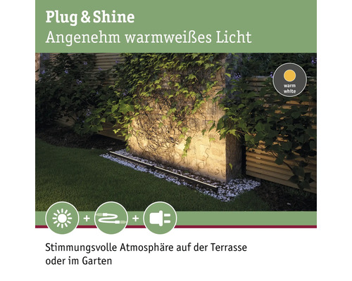 Plug and Shine Gartenbeleuchtung mit warmweißem Licht an einer Mauer