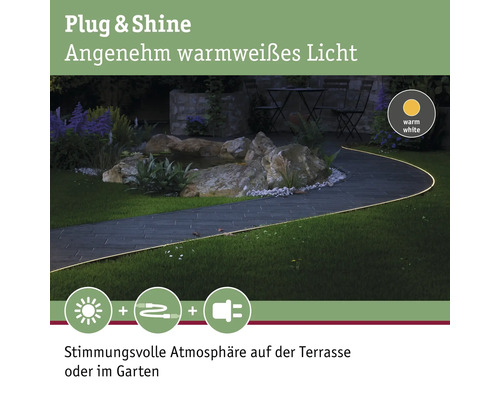 Gartenweg beleuchtet mit Plug and Shine Lichtsystem für eine stimmungsvolle Atmosphäre.