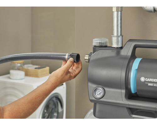 Installation einer Gartenpumpe mit Schlauchanschluss im Hauswirtschaftsraum