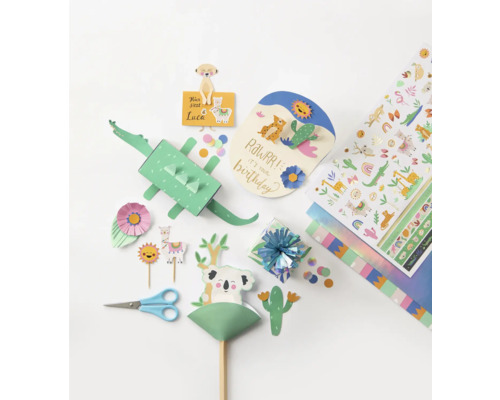 Dekorationsartikel für Kindergeburtstage mit Tiermotiven, Grußkarte und Geschenkpapier
