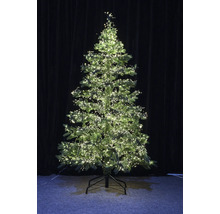 Künstlicher Weihnachtsbaum mit Beleuchtung auf einem Ständer