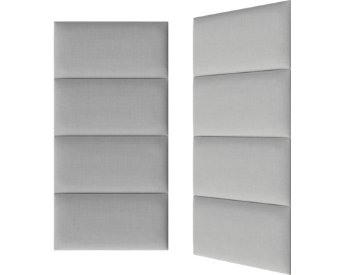 Zwei graue, rechteckige Wandpaneele mit Polsterung, jeweils in vier Segmente unterteilt.