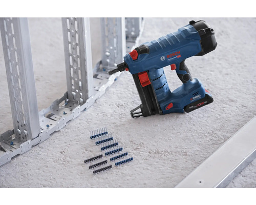 Akku-Bolzensetzgerät mit Bolzen und Metallrahmenkonstruktion