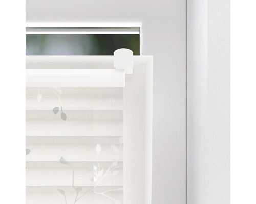 Detailansicht eines Fensterrollos mit floralem Muster