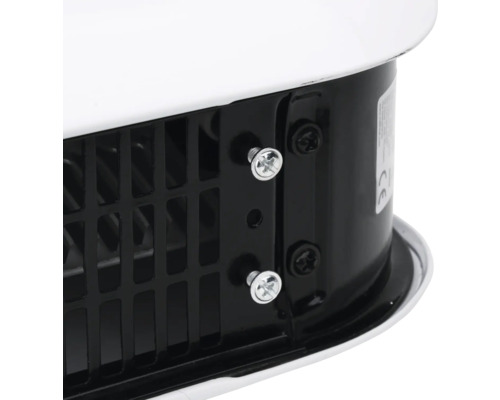 Detailansicht eines Heizlüfters mit Lüftungsgitter und Schrauben