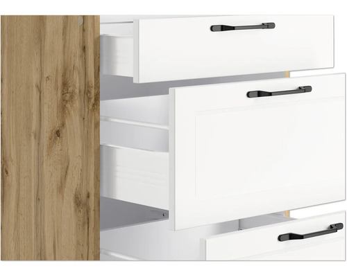 Schrank mit weißen Schubladen und Holzstruktur an der Seite