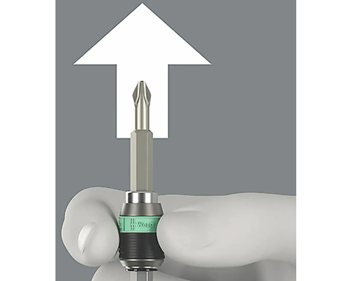 Ein Kreuzschlitz-Schrauberbit mit einer weißen Markierung, der von einer Hand gehalten wird.