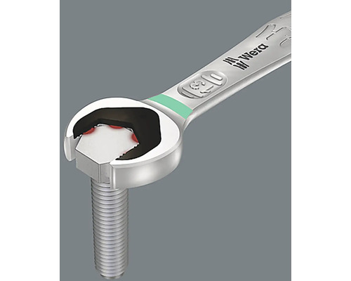 Ein Maulschlüssel der Marke Wera greift eine Schraube.